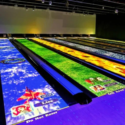 lose-up view of bowling alley lanes featuring augmented reality bowling games, highlighting interactive elements.