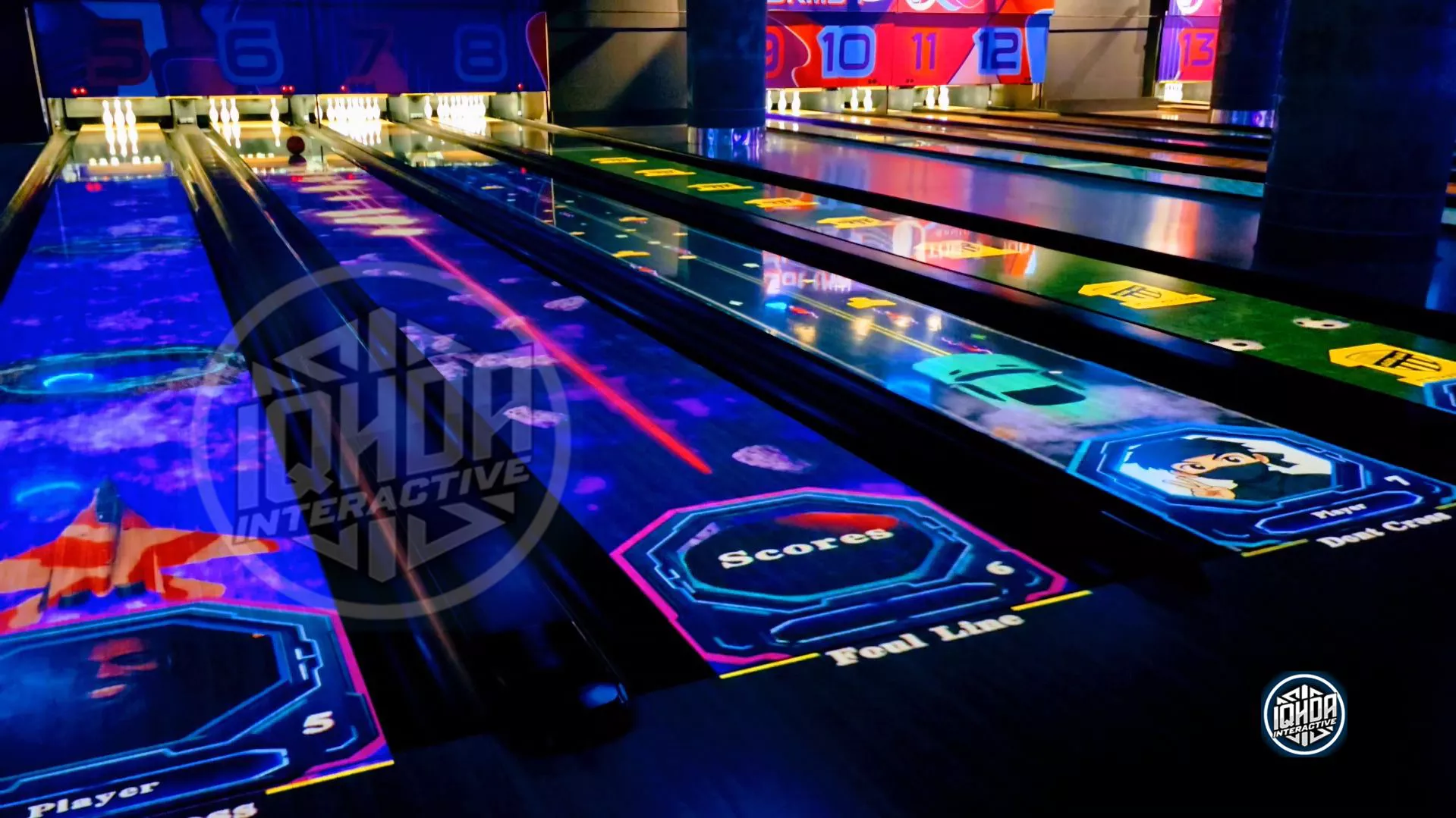 Lane AR bowling with asteroid-themed projection game by IQHDA Interactive, alongside other interactive lanes